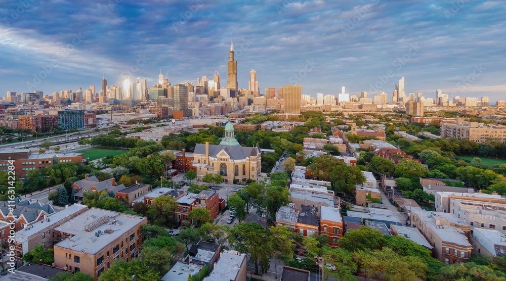 Fototapeta premium Chicago cityscape at sunrise, showing residential buildings and the city skyline. Urban landscape. University Village - Little Italy, Chicago, Illinois, United States Of America