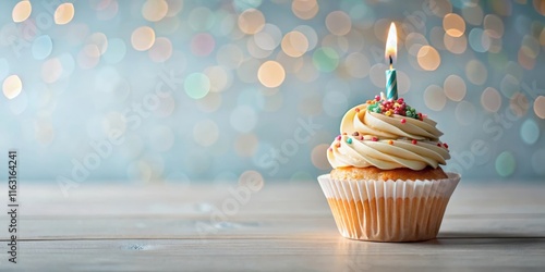 Delicious birthday cupcake on table on light background, joyful moment