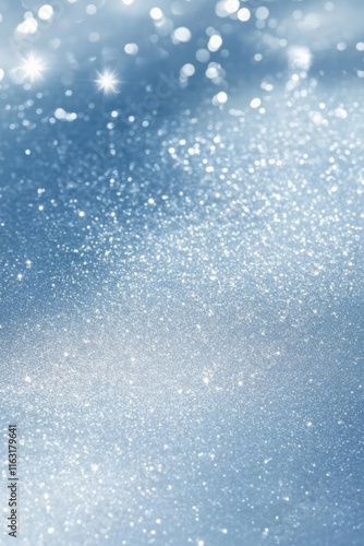 Shimmering blue background with sparkling glitter and soft bokeh effect
