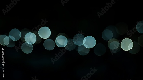 Abstract blur bokeh of soft glowing lights on dark background photo