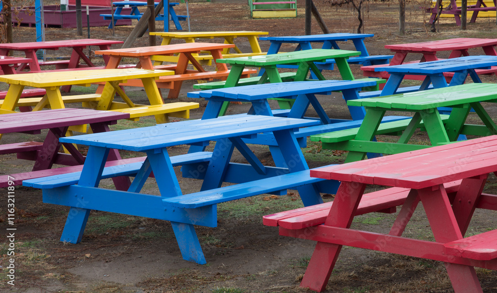 chairs in a park, colored benches, wet benches, colorful, many colored benches
chairs in a park, colored benches, wet benches, colorful, many colored benches