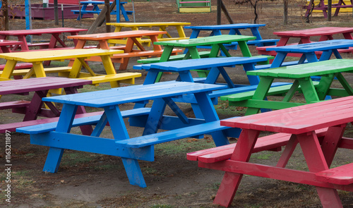 Wallpaper Mural chairs in a park, colored benches, wet benches, colorful, many colored benches
 Torontodigital.ca