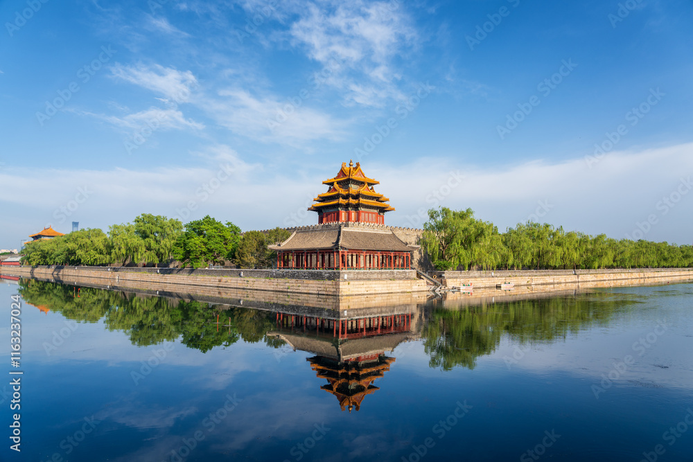 Corner tower of the Forbidden City with reflection Corner tower of the Forbidden City with reflection