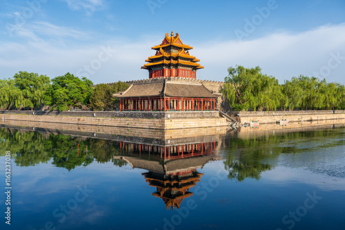 Corner tower of the Forbidden City with reflection photo