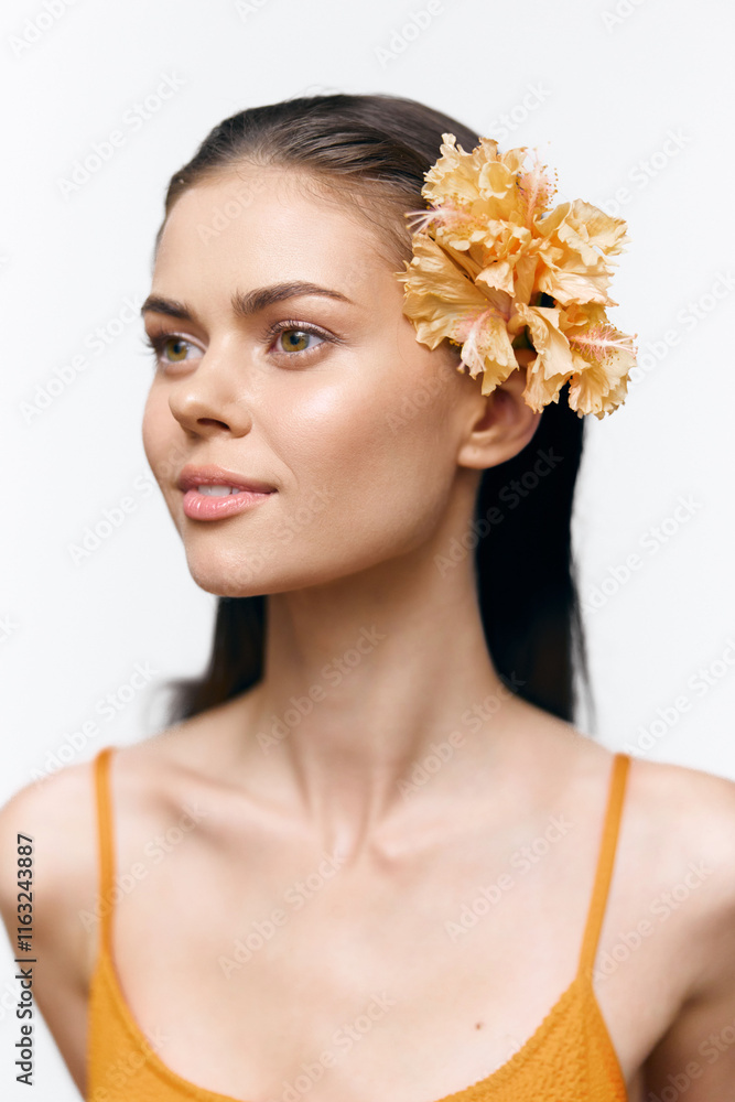 Young woman with a floral accessory, showcasing natural beauty and a serene expression against a soft, neutral background. Young woman with a floral accessory, showcasing natural beauty and a serene expression against a soft, neutral background.