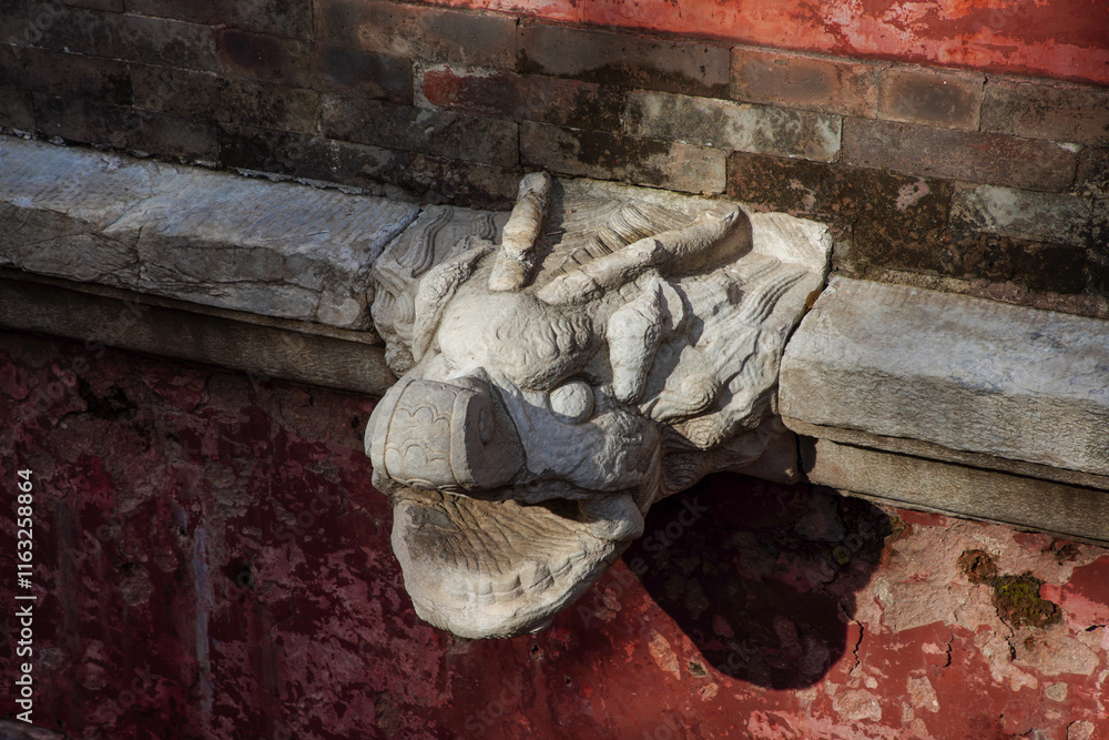 The dragon head on the Tibetan watchtower in the Four Great Regions scenic area of Summer Palace in Beijing.