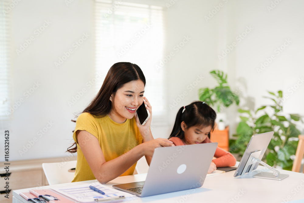 pretty young woman works from home doing home office and her daughter has homeschooling pretty young woman works from home doing home office and her daughter has homeschooling