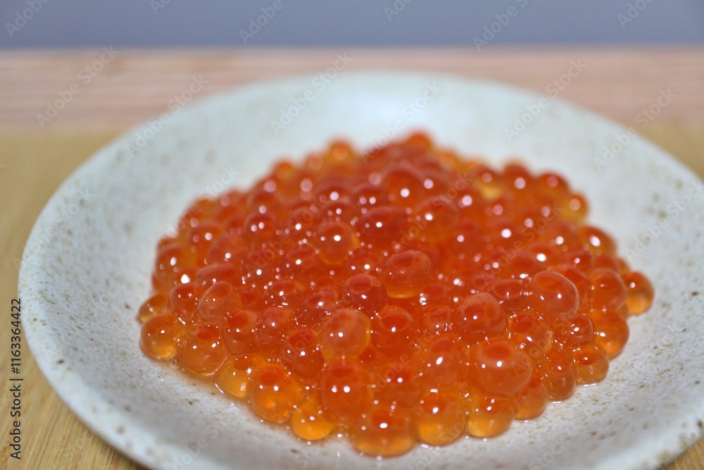 Ikura (salmon roe) marinated in soy sauce purchased at a supermarket in Tokyo, Japan Ikura (salmon roe) marinated in soy sauce purchased at a supermarket in Tokyo, Japan