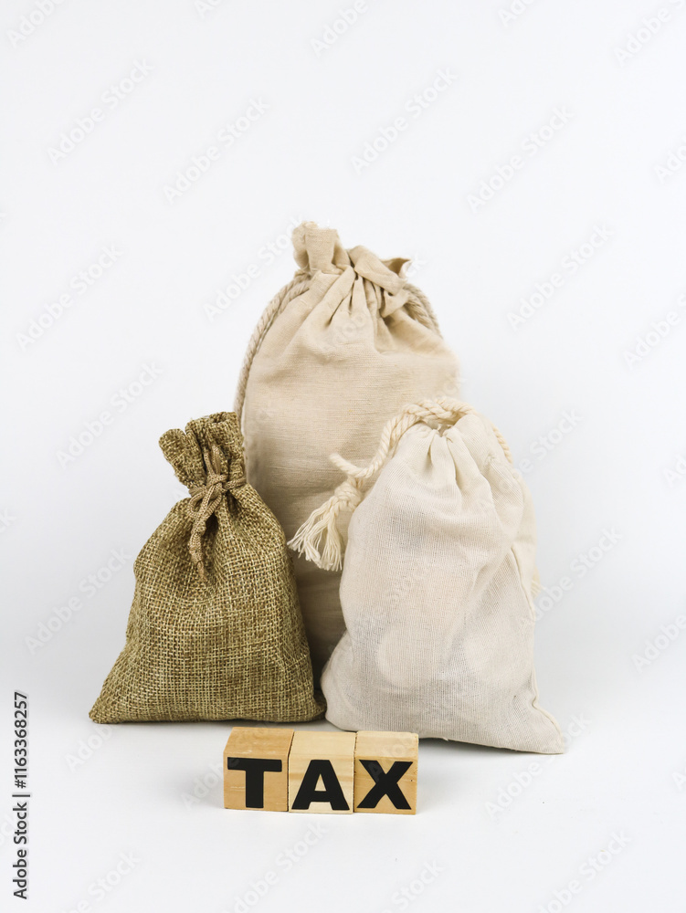 Coins pouch as illustration of tax Coins pouch as illustration of tax