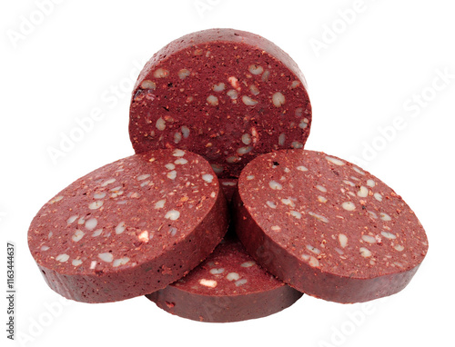 Canvas Print Four traditional English black pudding slices made with dried pork blood, wheat,