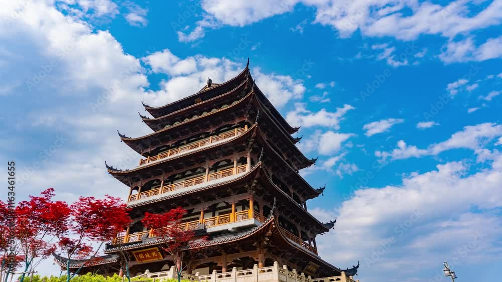 Exploring ancient architecture in summer city under a blue sky with white clouds Exploring ancient architecture in summer city under a blue sky with white clouds