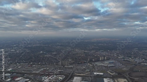 Wallpaper Mural Aerial footage of dramatic cloudy sky above the urban Kitchener, Ontario cityscape in Canada Torontodigital.ca