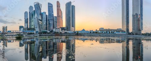 Photography High buildings of Moscow-City at Moskva River at summer sunset, Russia