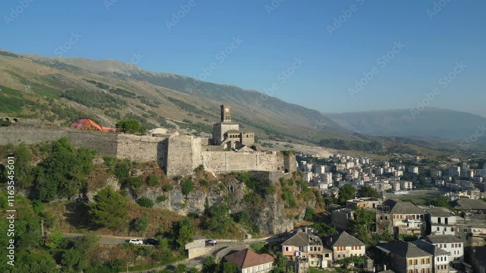 A Unique Perspective of Gjirokastër Castle Highlighting the Iconic Clock Tower A Unique Perspective of Gjirokastër Castle Highlighting the Iconic Clock Tower