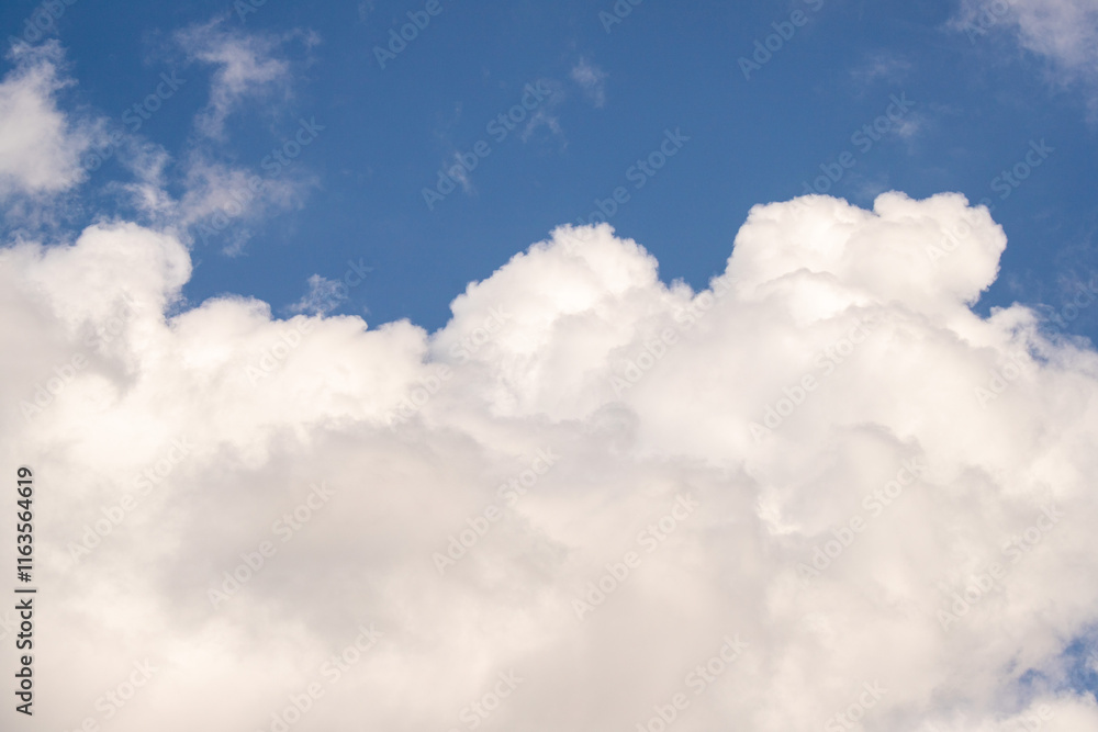 Sky background with clouds. White clouds against a blue sky. Sky background with clouds. White clouds against a blue sky.