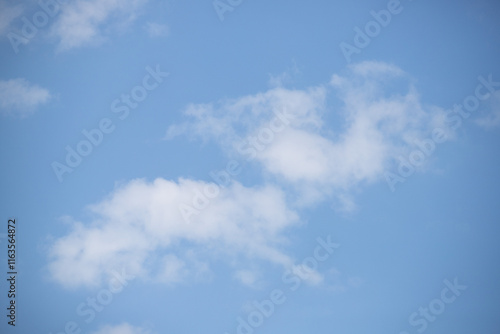 White clouds on blue sky, cloudy sky background.