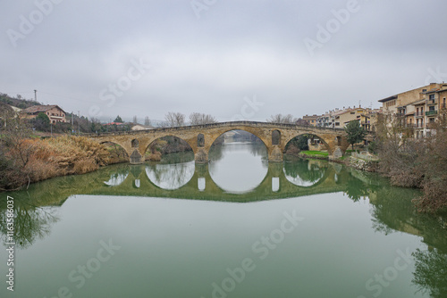 Puente la Reina, Spain - 29 Dec, 2024: Medieval bridge in Puente La Reina, Navarre, Spain photo