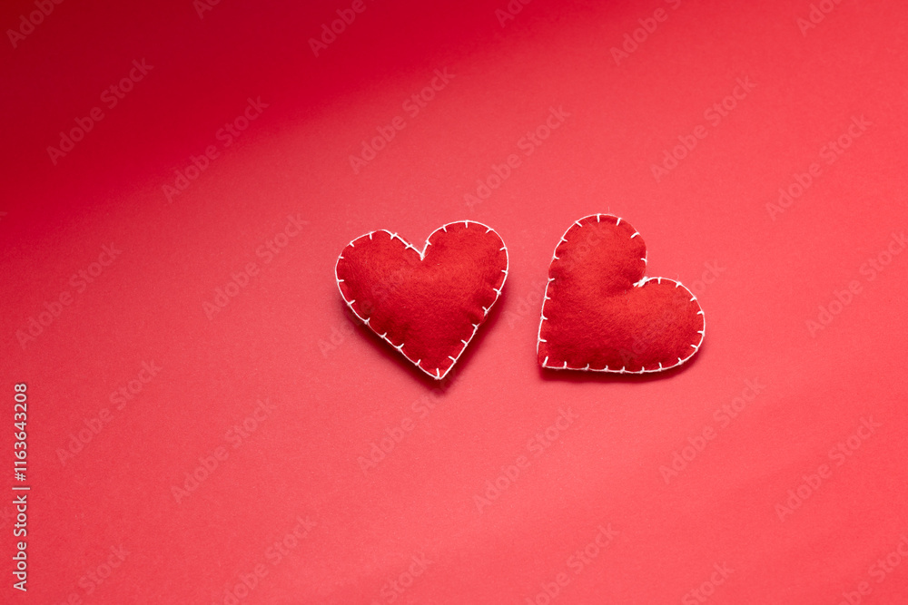 love and relationship abstraction, handmade wool red hearts on red background, dating and valentine's day concept love and relationship abstraction, handmade wool red hearts on red background, dating and valentine's day concept