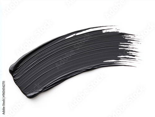 Black mascara texture, brush stroke isolated on white background. Cosmetic product swatch