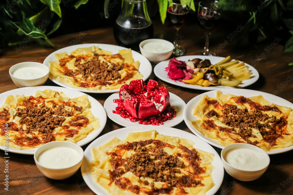 Delicious spread of traditional dishes and desserts at a festive gathering Delicious spread of traditional dishes and desserts at a festive gathering