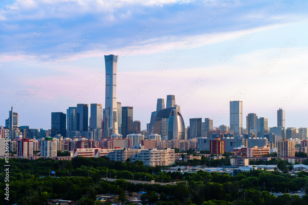 Fototapeta premium Skyline of Beijing CBD area at sunset, with cloud in the sky