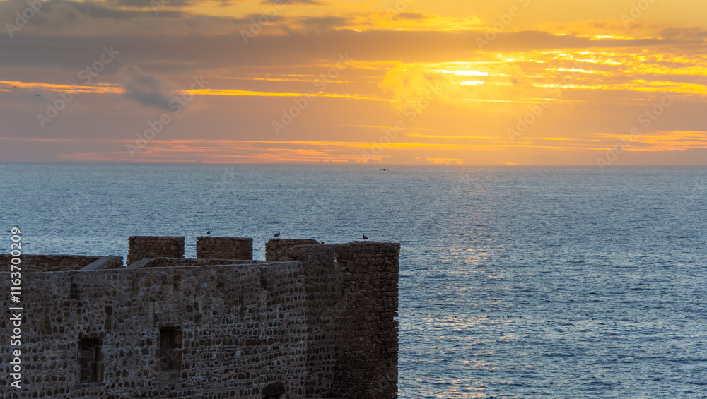 Sunset over the Atlantic above the Safi fortress in Morocco Sunset over the Atlantic above the Safi fortress in Morocco