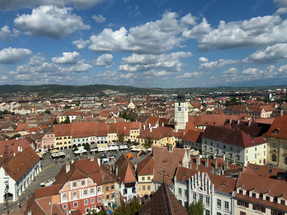 Obraz premium Historic Buildings in Sibiu's Old Town under Clear Blue Skies