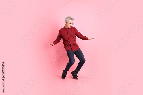 50s Man in red shirt