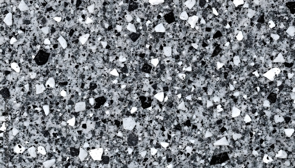 Granite surface with black and white tones. Fine natural speckling for a smooth, elegant texture Granite surface with black and white tones. Fine natural speckling for a smooth, elegant texture
