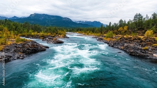 Serene Flowing River Amidst Majestic Mountains and Pine Forests