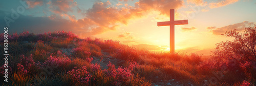 The cross on a hill with a glowing sunrise behind,