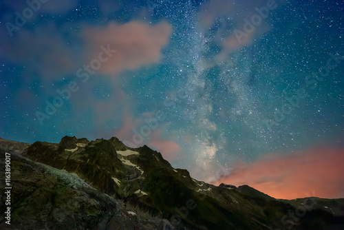 Scenic view of Milky Way above Aiguille de Midi mountain at night photo