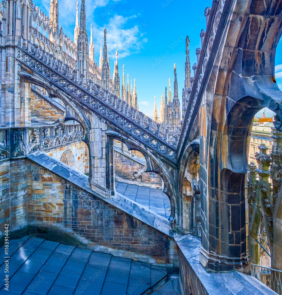 Flying buttresses in Gothic style on the roof of Milan Cathedral, Italy