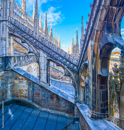 Obraz na płótnie Flying buttresses in Gothic style on the roof of Milan Cathedral, Italy w salonie