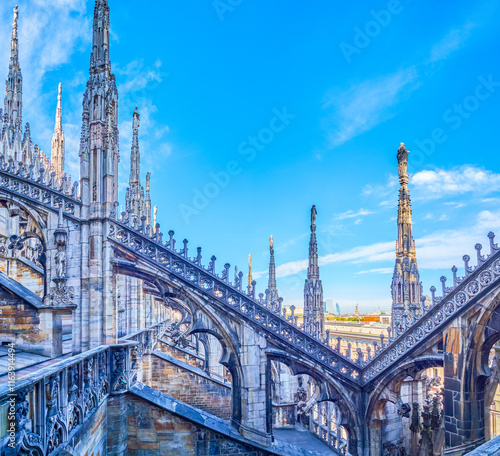 Obraz na płótnie Flying buttresses in Gothic style on the roof of Milan Cathedral, Italy w salonie