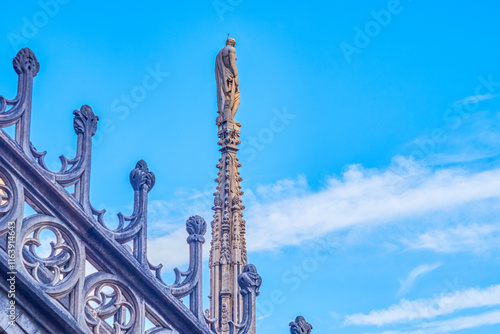 Obraz na płótnie Statues of saints, angels, and religious figures on the spires of Milan Cathdral, Italy w salonie