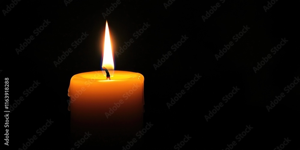 A solitary candle flickering in the darkness, symbolizing hope and serenity. A solitary candle flickering in the darkness, symbolizing hope and serenity.