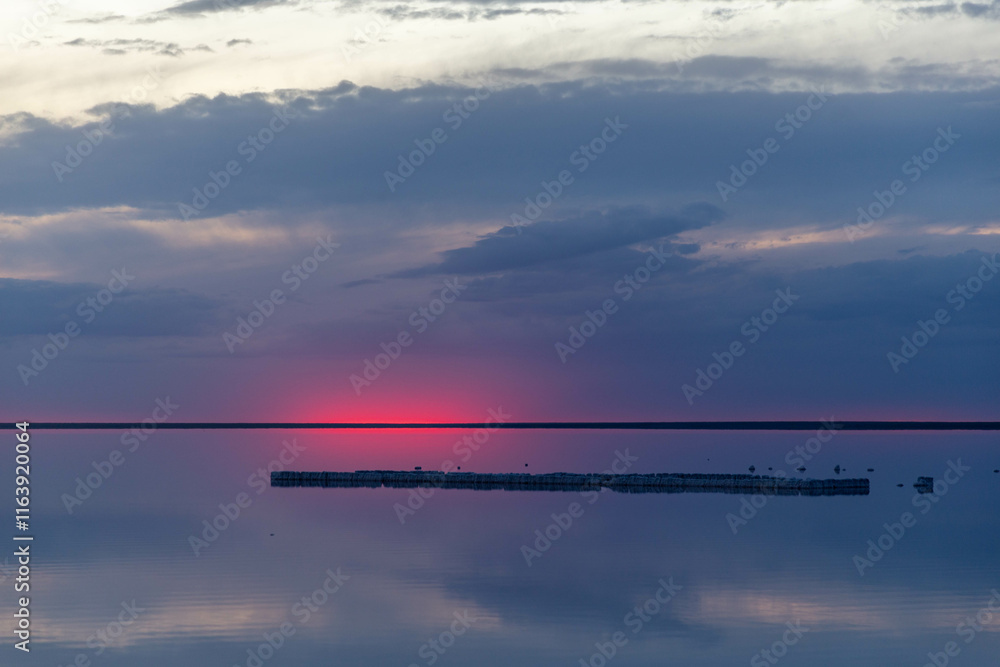 Beautiful sunset on the Elton salt lake. Volgograd region, Russia Beautiful sunset on the Elton salt lake. Volgograd region, Russia