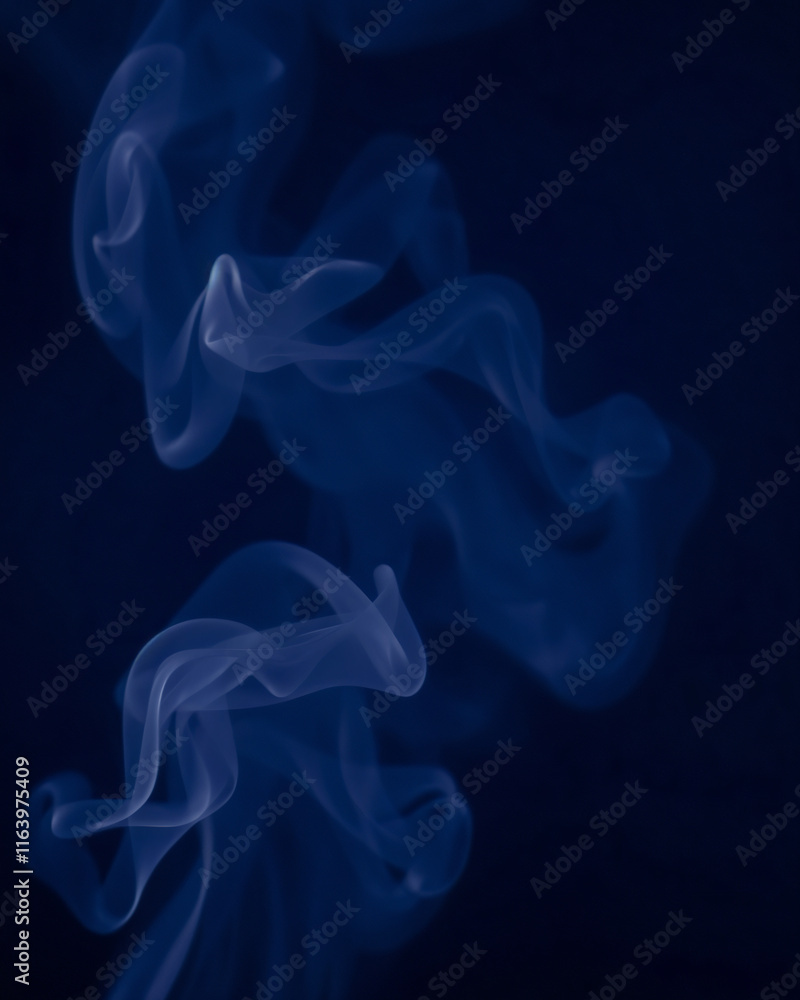 Fototapeta premium blue smoke waves on dark blue background 