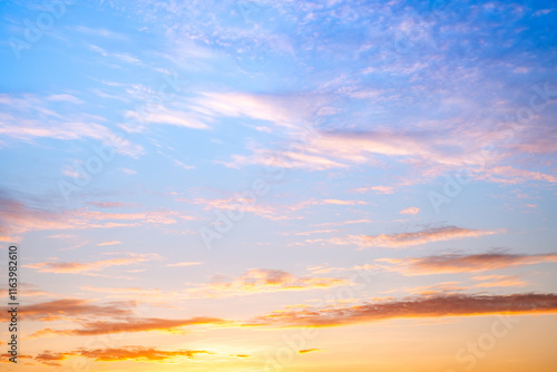 Sky,sunset, beautiful , luxury soft gradient orange gold clouds and sunlight on the blue sky perfect for the background, Sunrise on morning or everning in winter warm time ,Twilight summer,silhouette photo