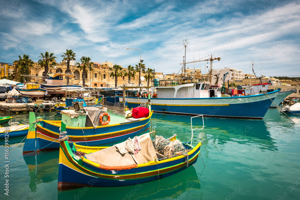fishing boats near fishing village of Marsaxlokk (Marsascala) in Malta fishing boats near fishing village of Marsaxlokk (Marsascala) in Malta