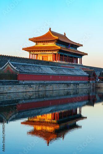 Gate of Divine Prowess of the Forbidden City under blue sky in morning sunlight