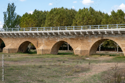 Obraz na płótnie Bridge over the Porma River in the town of Puente Villarente de Villaturiel on the Camino de Santiago in the Province of Leon w salonie