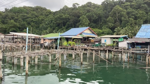 fisherman village in Thailand, Ko kut Island, stilt house over sea, and tropical forest