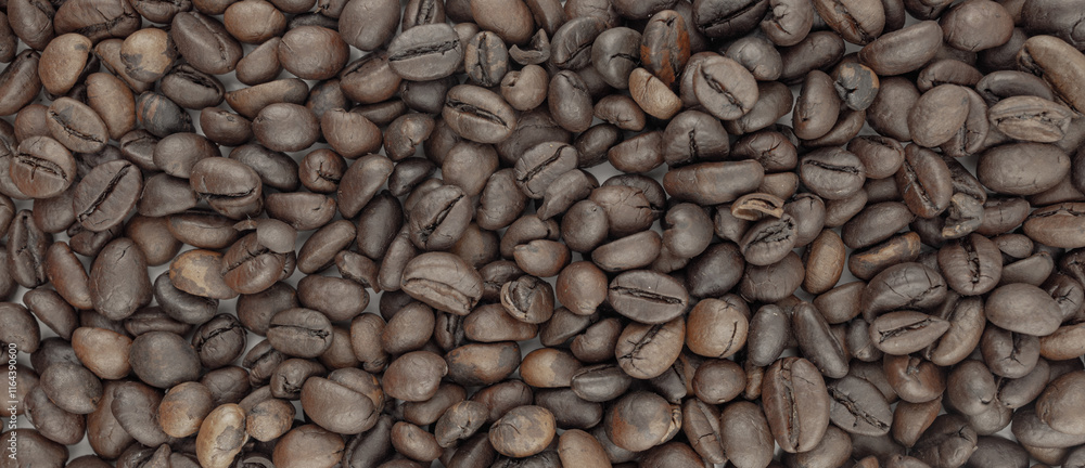 Fototapeta premium Roasted coffee beans, rich brown color, close-up view. Perfect for coffee packaging, websites, or any project needing a coffee theme.