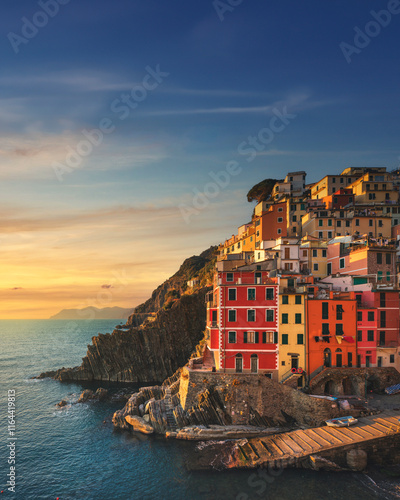 Fototapeta Naklejka Na Ścianę i Meble -  Wonderful sunset over Riomaggiore fishing village. Cinque Terre, Italy