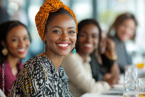 Women enjoying a joyful gathering at a stylish event with smiles and vibrant ...