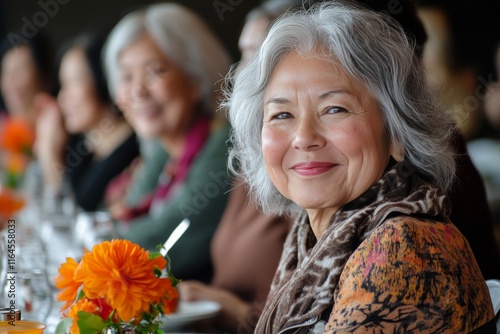 Women enjoying a joyful gathering at a stylish event with smiles and vibrant ...
