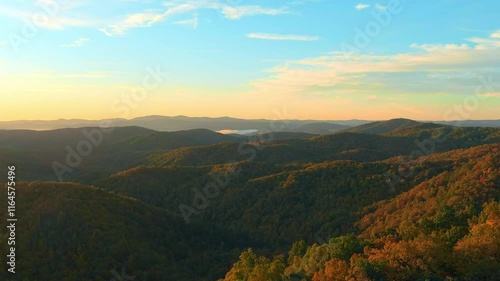 Aerial view of autumn colors at sunrise in the Blue Ridge Mountains of North Carolina.