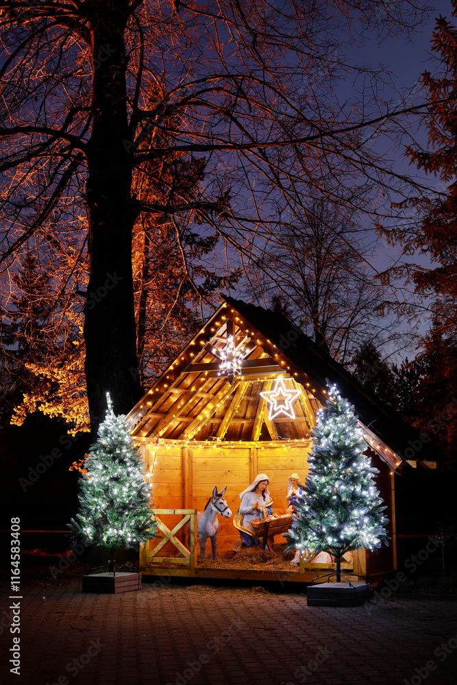 SPYTKOWICE, POLAND - DECEMBER 29, 2024: Traditional Christmas decorations, nativity scene by the church in Spytkowice, Poland.